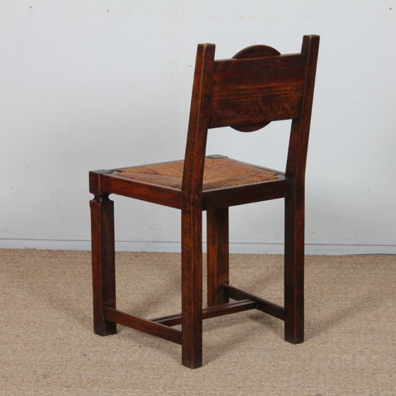 Image 1 of Juego de 6 sillas de madera maciza con asiento de paja, fabricación francesa, 1940.