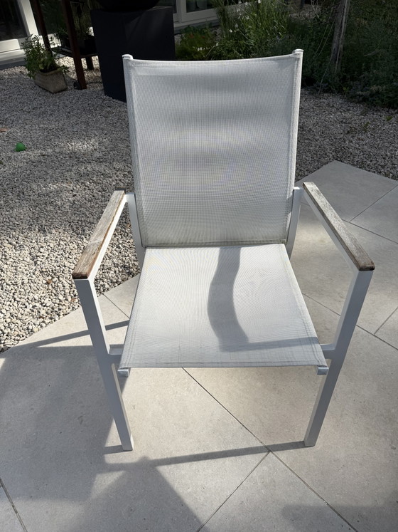 Image 1 of 10 white textile garden chairs