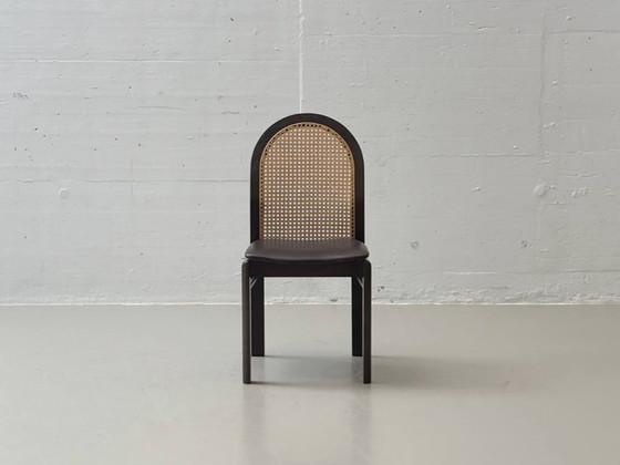 Image 1 of Set van 6 stoelen met rieten en lederen zittingen van Dietiker, jaren 80.