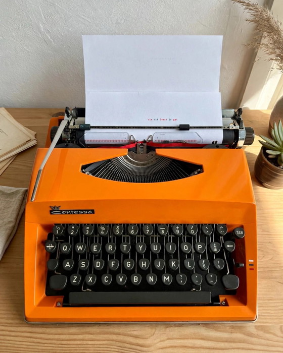 Orange Adler Contessa de Luxe Typewriter – Decorative Objects, Metal, Plastic (photo 2 of 15)