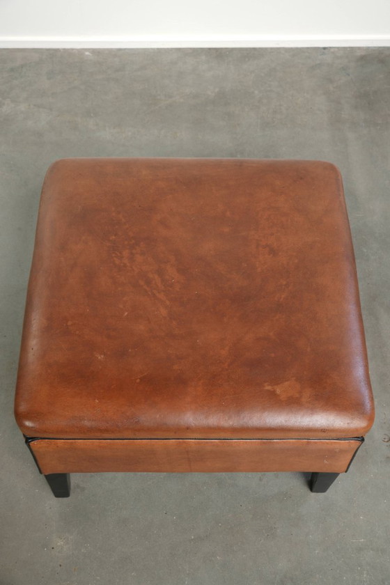 Versatile sheepskin leather footstool/pouf in a warm cognac color – Footstools & poufs, Klassiek (photo 6 of 10)