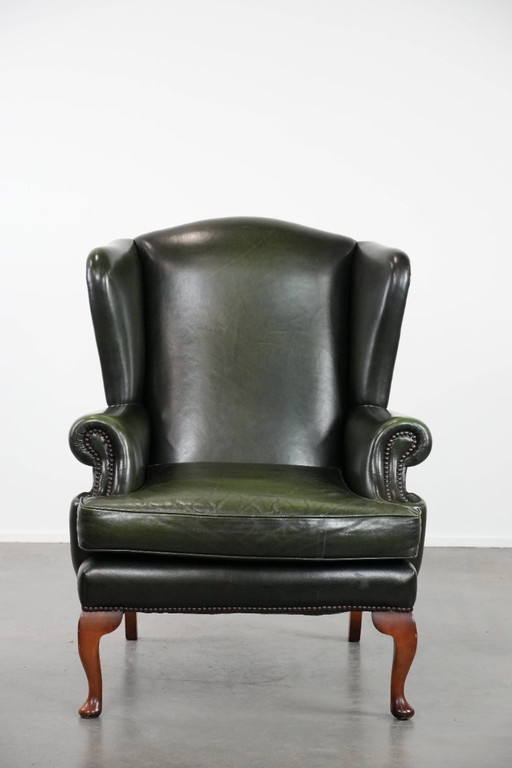 Fauteuil Chesterfield classique en cuir de vachette lisse de couleur vert foncé