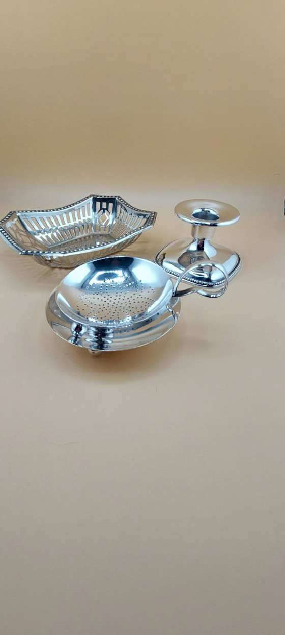Image 1 of Lot of silver-plated items including candlestick, small bowl, tea strainer
