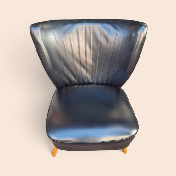 Vintage armchair black faux leather with wooden legs, Plastic (photo 2 of 6)