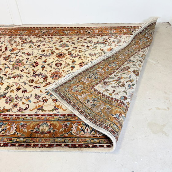 Image 1 of Large vintage rug with floral pattern