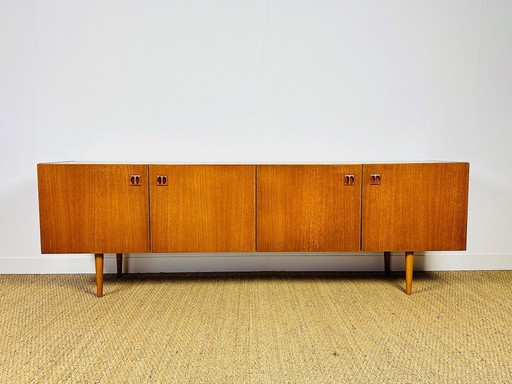 Scandinavian teak sideboard with 4 doors and tapered legs, 1960