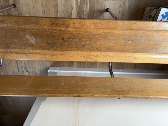 Image 1 of Houten bank met stalen frame