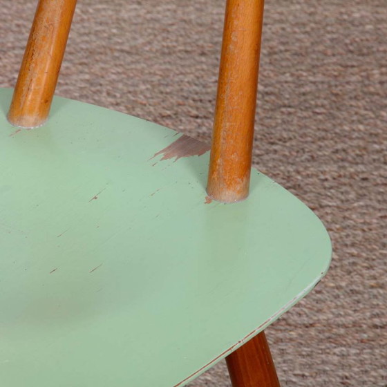 Image 1 of Groene stoel geproduceerd door Ton in de jaren 1960