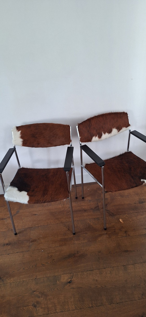 Image 1 of Two Gijs van der Sluis chairs with cowhide.