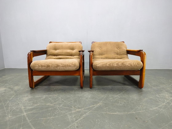 Image 1 of Twee Scandinavische loungestoelen uit de jaren 70, gemaakt van hout met corduroy bekleding.
