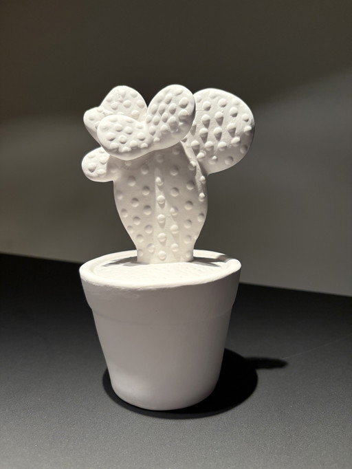 Modern cactus made of rough, white ceramic