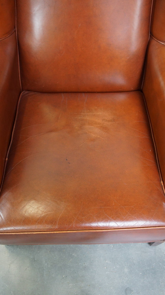 Image 1 of Fauteuil à oreilles en cuir de boeuf