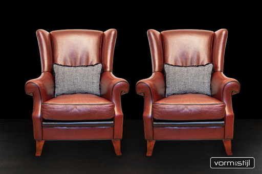 2 fauteuils à oreilles Mol & Geurts en cuir de taureau