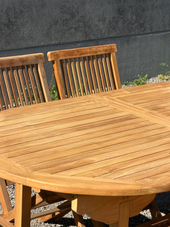 Mesa de jardín ovalada extensible de teca + 6 sillas plegables – Set promocional – Conjuntos de jardín (photo 10 of 10)