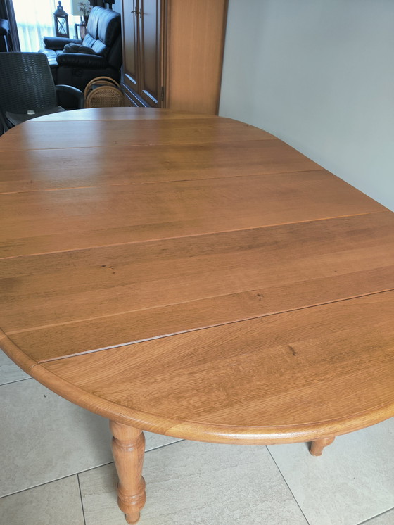 Image 1 of In large adjustable oak table