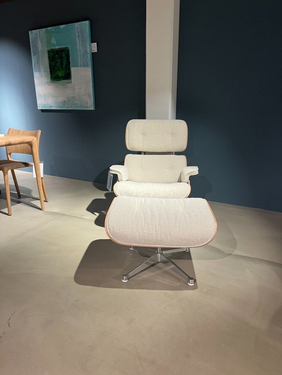 Image 1 of Fauteuil lounge Vitra Eames et repose-pieds
