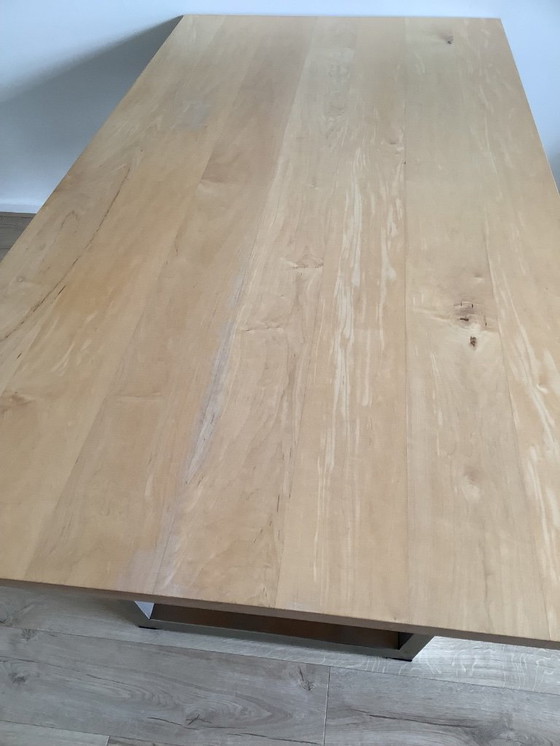 Image 1 of Design-Esstisch 100x200 cm, Tischplatte aus Massivholz und Gestell aus Edelstahl.