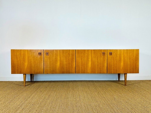 Scandinavian teak sideboard with four doors and tapered legs, 1960