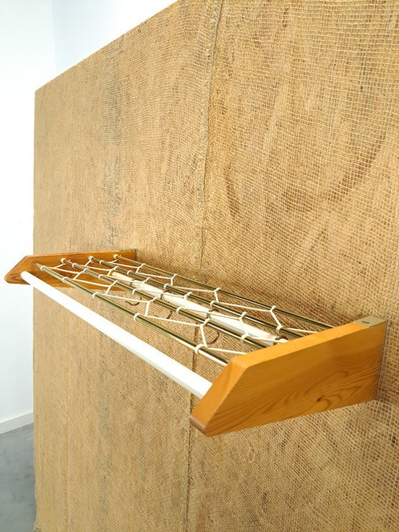 Image 1 of Coat rack from Sweden gold with wood, no. 11