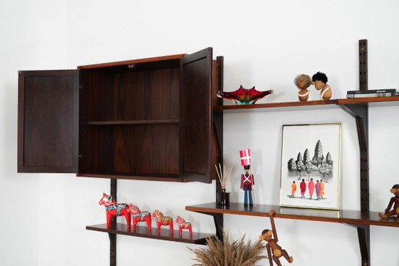 Modulaire stellingen van palissanderfineer van Poul Cadovius, Denemarken, jaren 70. – Wandkast, Mdf (photo 19 of 27)