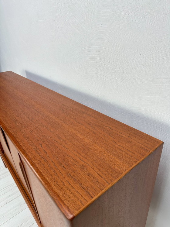Image 1 of Dänisches Teak-Highboard aus den 1960er Jahren von Axel Christensen für ACO Møbler – Mid-Century-Schrank mit Schiebetüren