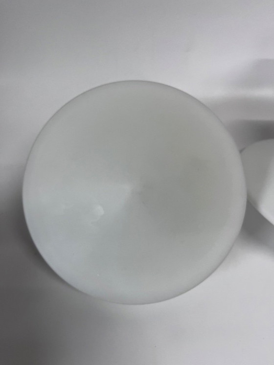 Image 1 of 2x RAAK discus Mid Century wandlamp wit opaalglas bakelieten armatuur model B1410