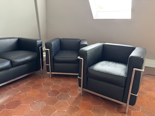 Designer-Wohnzimmergarnitur – Schwarzes Leder & Stahl