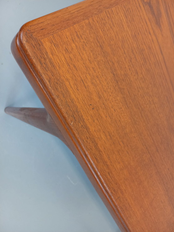 Image 1 of Scandinavian rectangular vintage dining table by Johannes Andersen for Samcom from the 60s in teak with integrated extensions