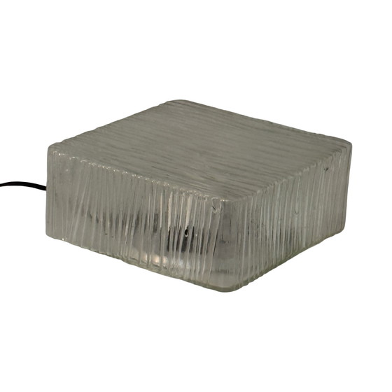 Image 1 of Art deco style lamp made from a metal base that houses an opaline dome. The dome is secured in place with a spring mechanism mak