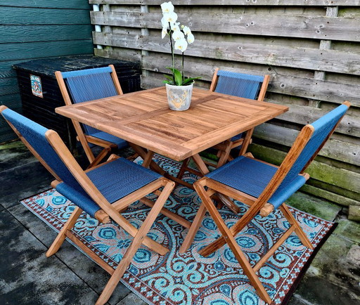 Conjunto de jardín de teca con 4 sillas plegables