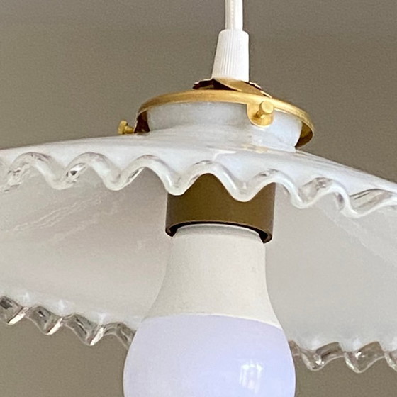 Image 1 of Antique pendant light with a white opaline glass shade and a transparent wavy edge