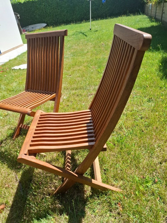 Image 1 of Lot de 4 chaises de jardin pliantes en Teck massif + 4 coussins de chaises à dossier offerts