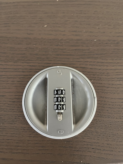 Bookcase with shelves and combination lock