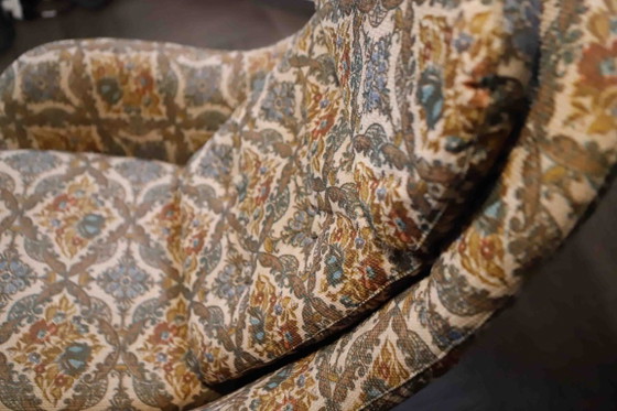 Image 1 of Set van 2 vintage draaibare fauteuils met hoge rugleuning en abstracte bekleding.