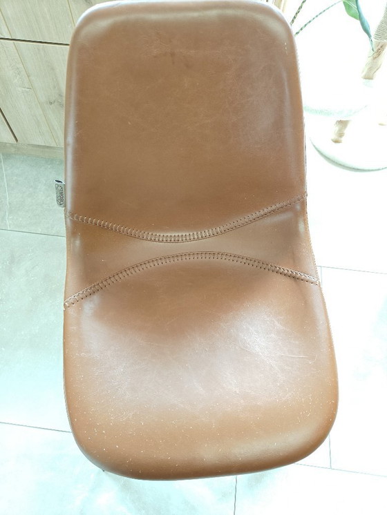 Image 1 of 7 Dutchbone cognac chairs