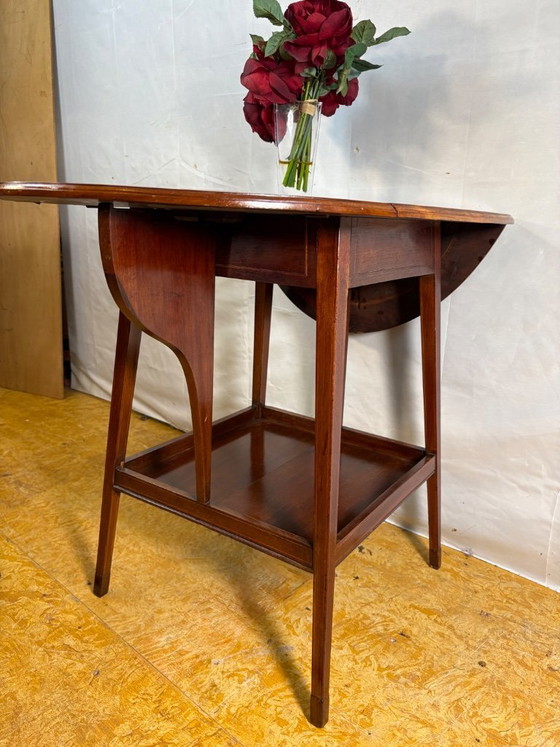 Image 1 of Antique Edwardian Mahogany Oval Drop Leaf Side Table (Circa 1900–1930)  A beautiful antique Edwardian oval drop leaf side table 