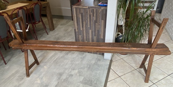 Image 1 of Twee massief eikenhouten boerenbanken van 214 cm voor een rustieke boerentafel uit de jaren 50.