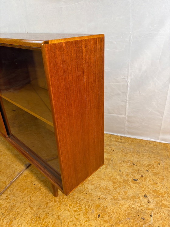 Image 1 of Mid Century Retro Teak & Glass Bookcase by Herbert E. Gibbs Circa 1960  A stylish and elegant mid century modern teak and glass 