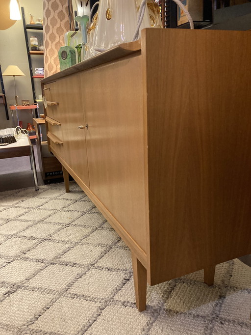 Lowboard/dresser in teak sleek lines with special details