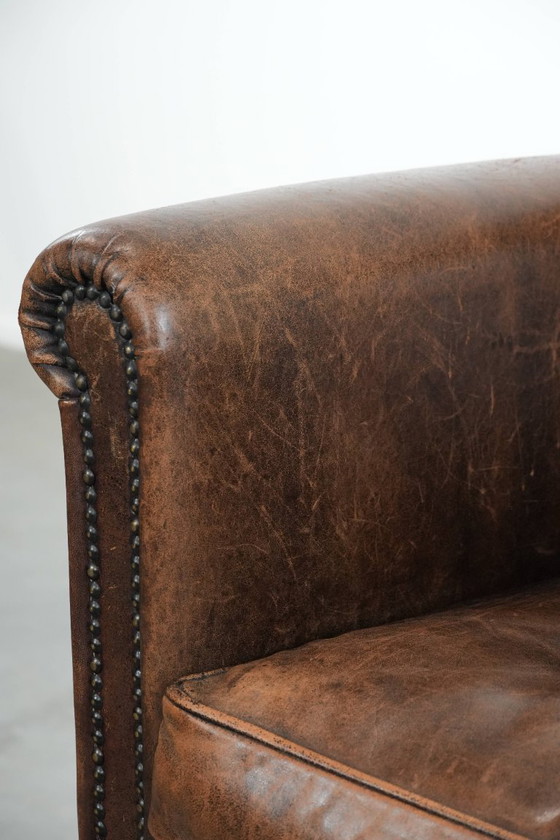 Image 1 of Fauteuil vintage en peau de mouton avec du caractère