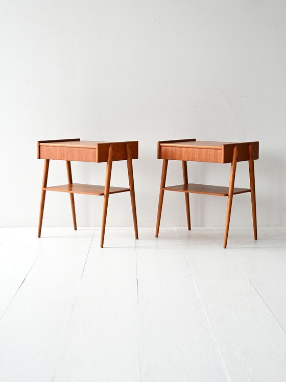 Image 1 of Paar vintage Scandinavische teakhouten nachtkastjes met verborgen lade