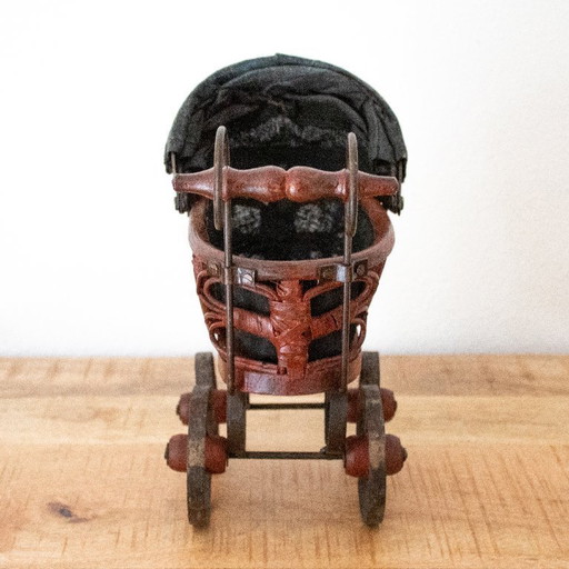 Antique Victorian-style doll pram