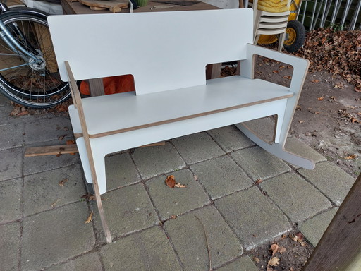 Slide-Art Swing Bench