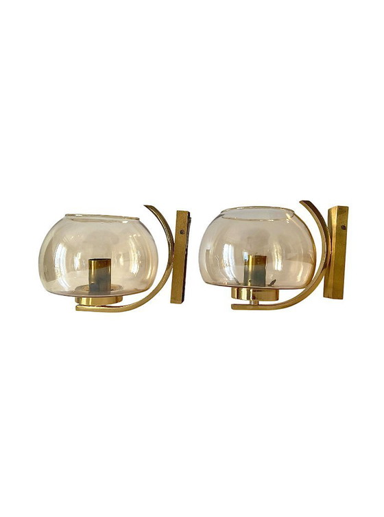 Image 1 of Arc vintage wall lights. Brass and smoked glass. 1970