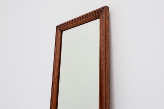 Image 1 of French art deco mirror with carved oak frame, ca. 1930s