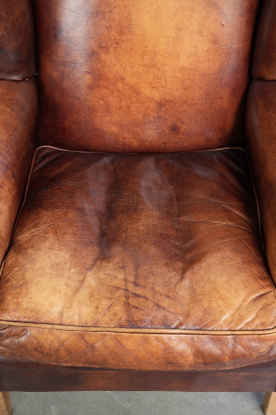 Image 1 of Comfortabele rundleren oorfauteuil in Engelse stijl met een prachtige warme kleurstelling en een karaktervolle uitstraling