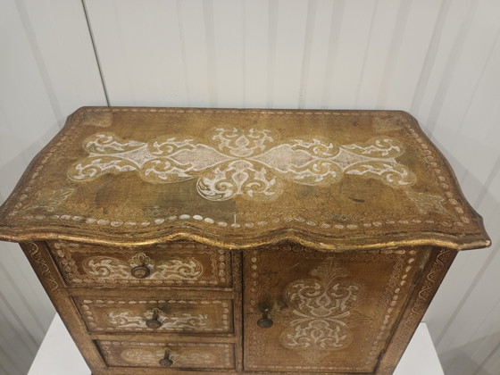 Image 1 of Gold-colored Florentine chest of drawers