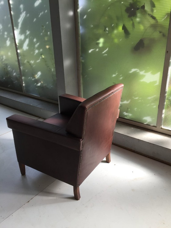 Image 1 of Unique "1930s armchair" with dark brown quality leather.