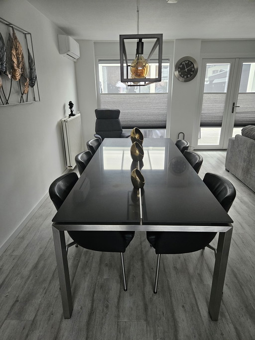 Karat design dining table with 6 leather armchairs