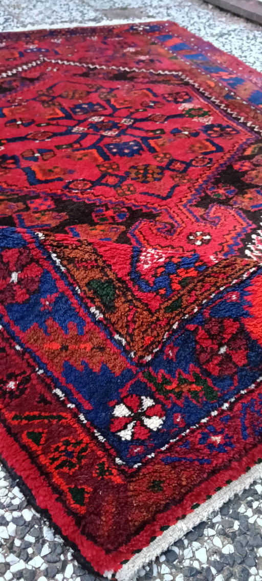 Hand-knotted vintage Persian rug 223x132cm